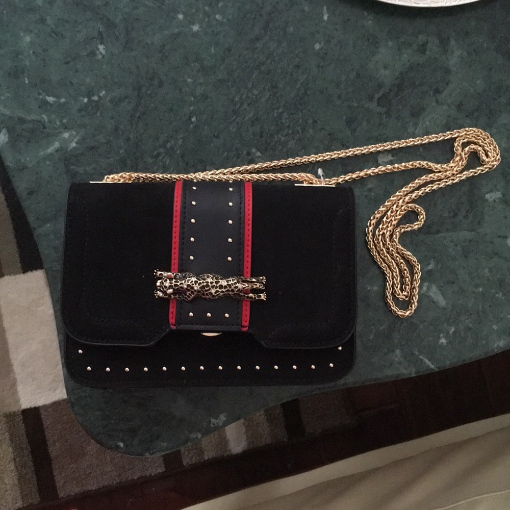 A Topshop Black, Gold Accented Hand bag
